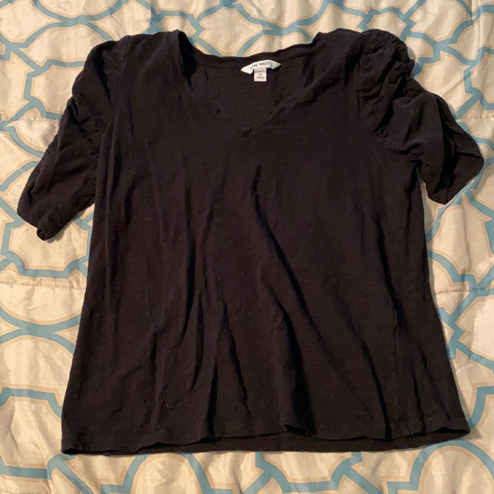 I’m selling a Medium Dull Black Nine West Shirt.